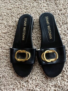 Stuart Weitzman Black Leather Slide Mules with Gold Hardware
